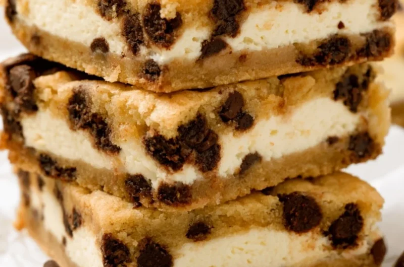 Chocolate chip cheesecake stuffed cookies on a baking tray