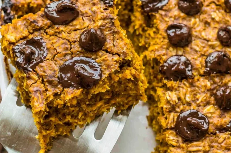 Delicious pumpkin baked oatmeal with chocolate chips in a cozy fall setting