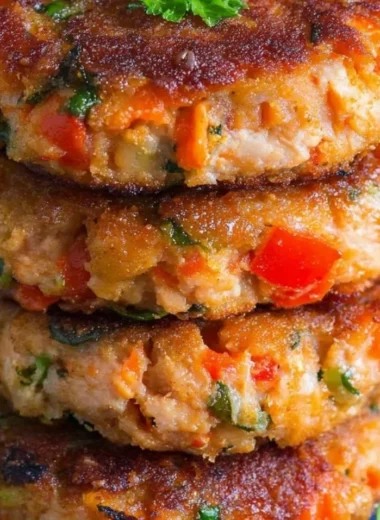 Delicious homemade salmon patties served with fresh garnish.
