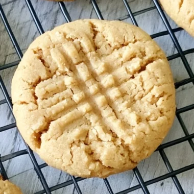 Soft peanut butter cookies on a cooling rack