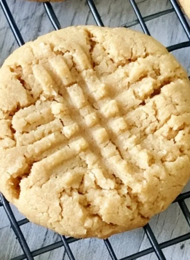Soft peanut butter cookies on a cooling rack