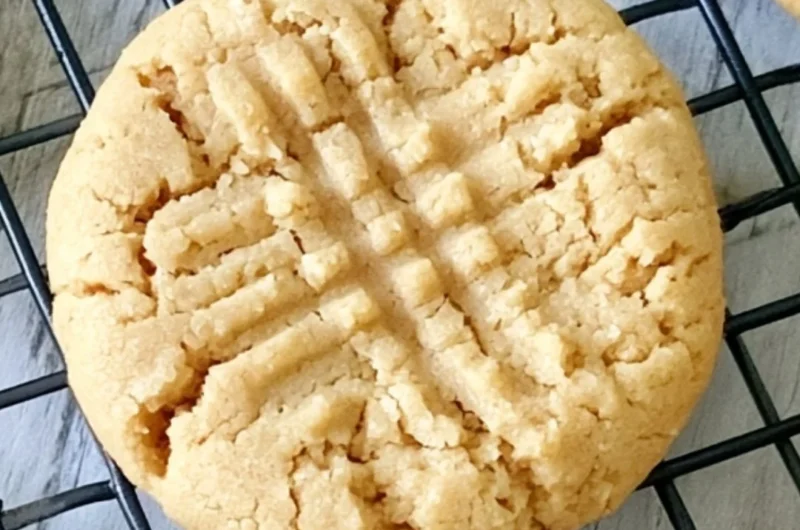 Soft peanut butter cookies on a cooling rack