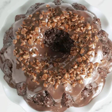 Delicious Texas Sheet Cake Bundt Cake topped with chocolate icing