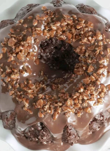 Delicious Texas Sheet Cake Bundt Cake topped with chocolate icing