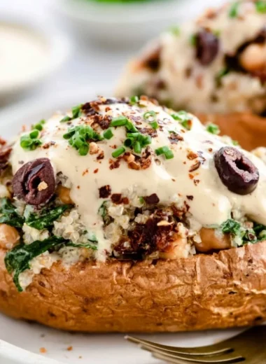 Vegan stuffed sweet potatoes filled with nutritious ingredients for a healthy meal.
