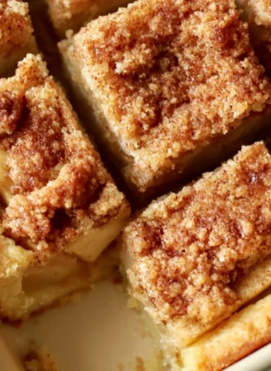 Delicious homemade apple pie bars with warm cinnamon and apple filling