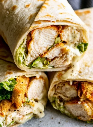 Delicious Chicken Caesar Wrap with grilled chicken, lettuce, and Caesar dressing