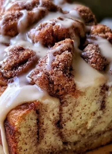 Freshly baked cinnamon roll banana bread with a cinnamon swirl