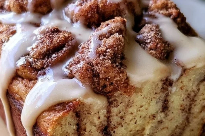 Freshly baked cinnamon roll banana bread with a cinnamon swirl