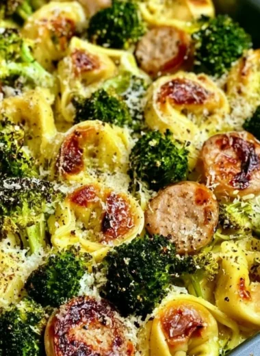 Sheet pan broccoli tortellini bake with vibrant vegetables and cheese
