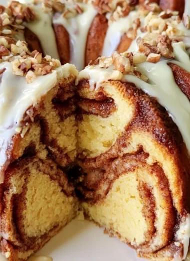 Delicious Easy Cinnamon Roll Bundt Cake on a serving plate