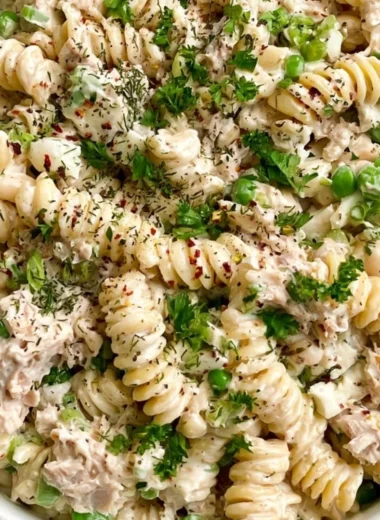 Bowl of easy tuna pasta salad with colorful vegetables and pasta