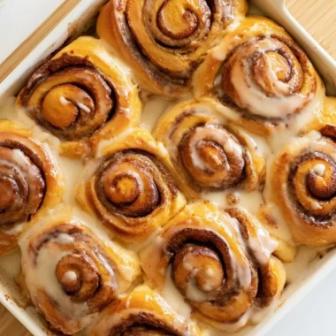 Delicious Heavy Whipping Cream Cinnamon Rolls topped with creamy icing