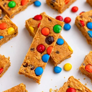 Delicious no-bake monster cookie protein bars made with oats and peanut butter