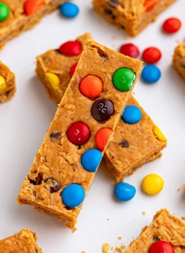Delicious no-bake monster cookie protein bars made with oats and peanut butter