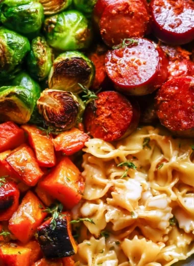 Autumn dinner plate with sausage, pasta, Brussels sprouts, and roasted butternut squash