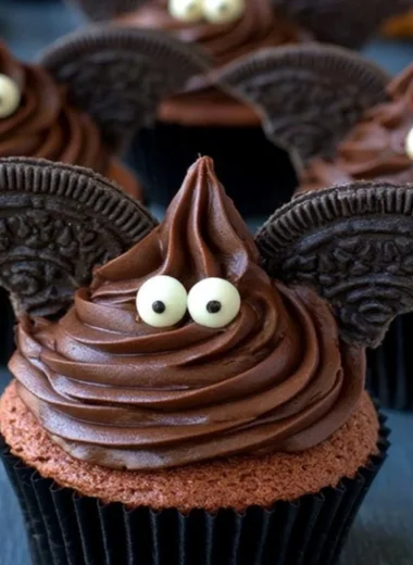 Delicious Halloween Bat Cupcakes decorated with chocolate frosting and bat wings