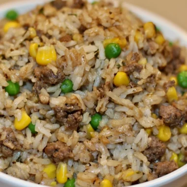 Homemade dirty rice with ground beef served in a bowl