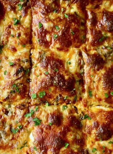 Delicious butternut squash lasagna with spinach and mushrooms, baked to perfection