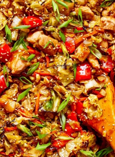 Colorful cabbage stir fry served in a bowl with vegetables