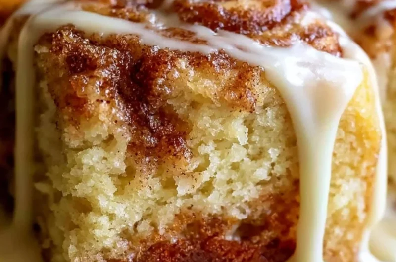 Delicious Cinnabon Cinnamon Roll Cake showcasing its cinnamon swirl and frosting