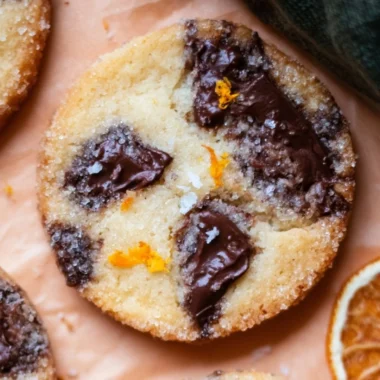 Homemade Dark Chocolate Orange Shortbread Cookies on a wooden platter