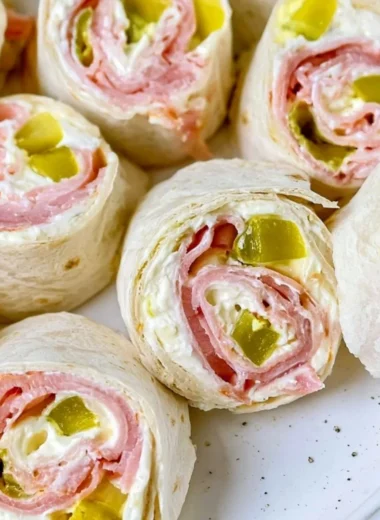 Delicious pickle dip pinwheels served on a platter