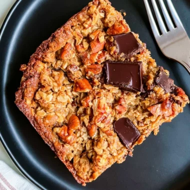 Delicious protein baked oatmeal topped with chocolate chunks fresh from the oven.