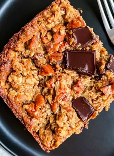 Delicious protein baked oatmeal topped with chocolate chunks fresh from the oven.