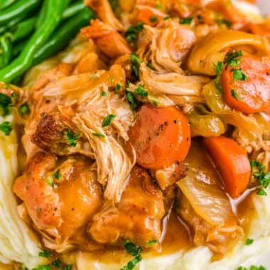 Delicious slow cooker chicken pot roast with vegetables in a serving dish