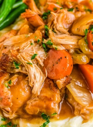 Delicious slow cooker chicken pot roast with vegetables in a serving dish