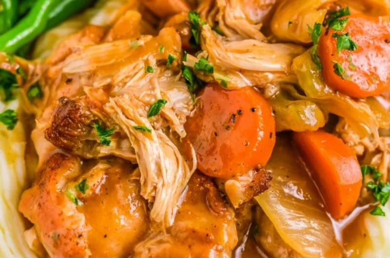 Delicious slow cooker chicken pot roast with vegetables in a serving dish
